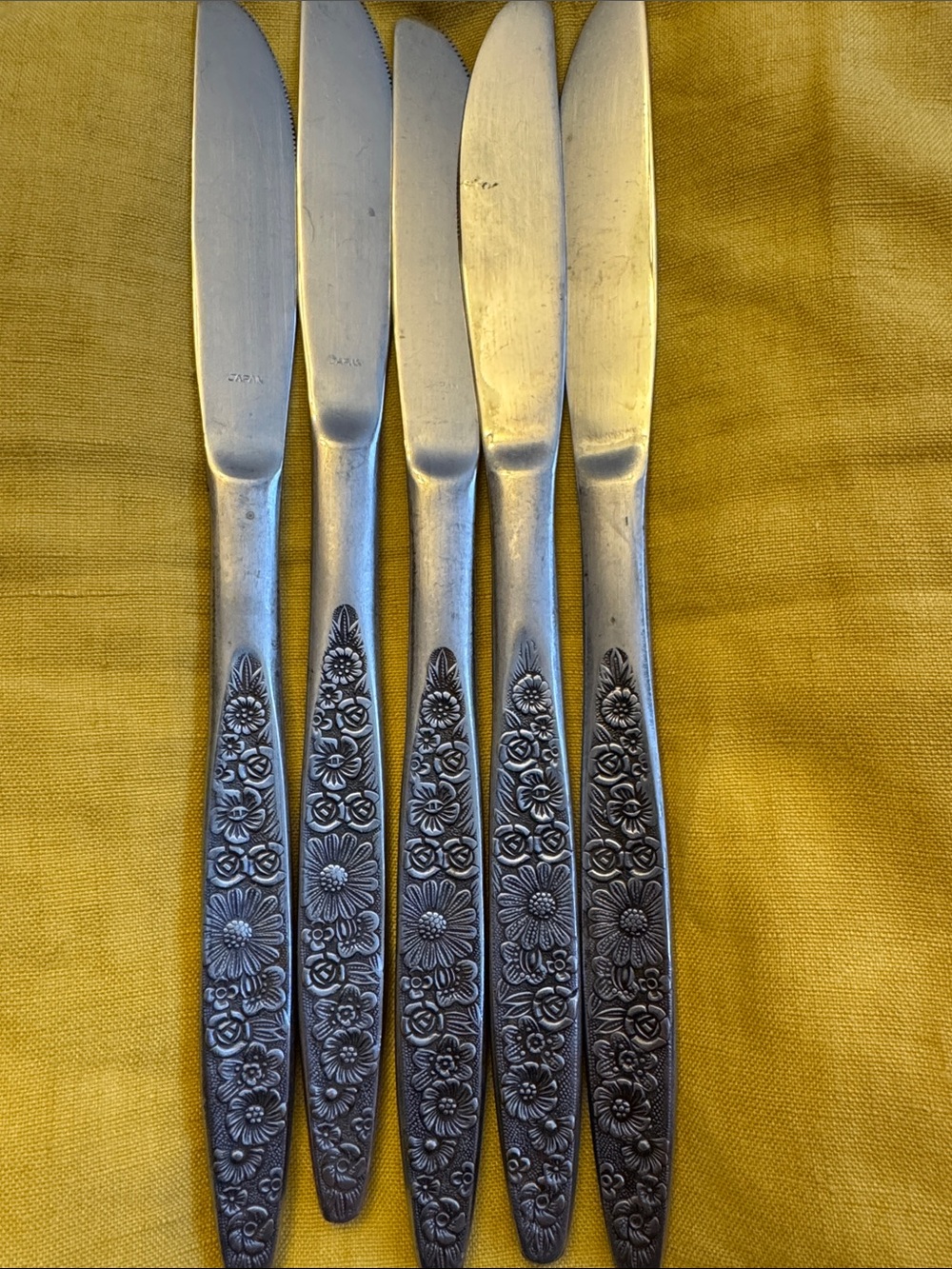 5 floral handled butter knives